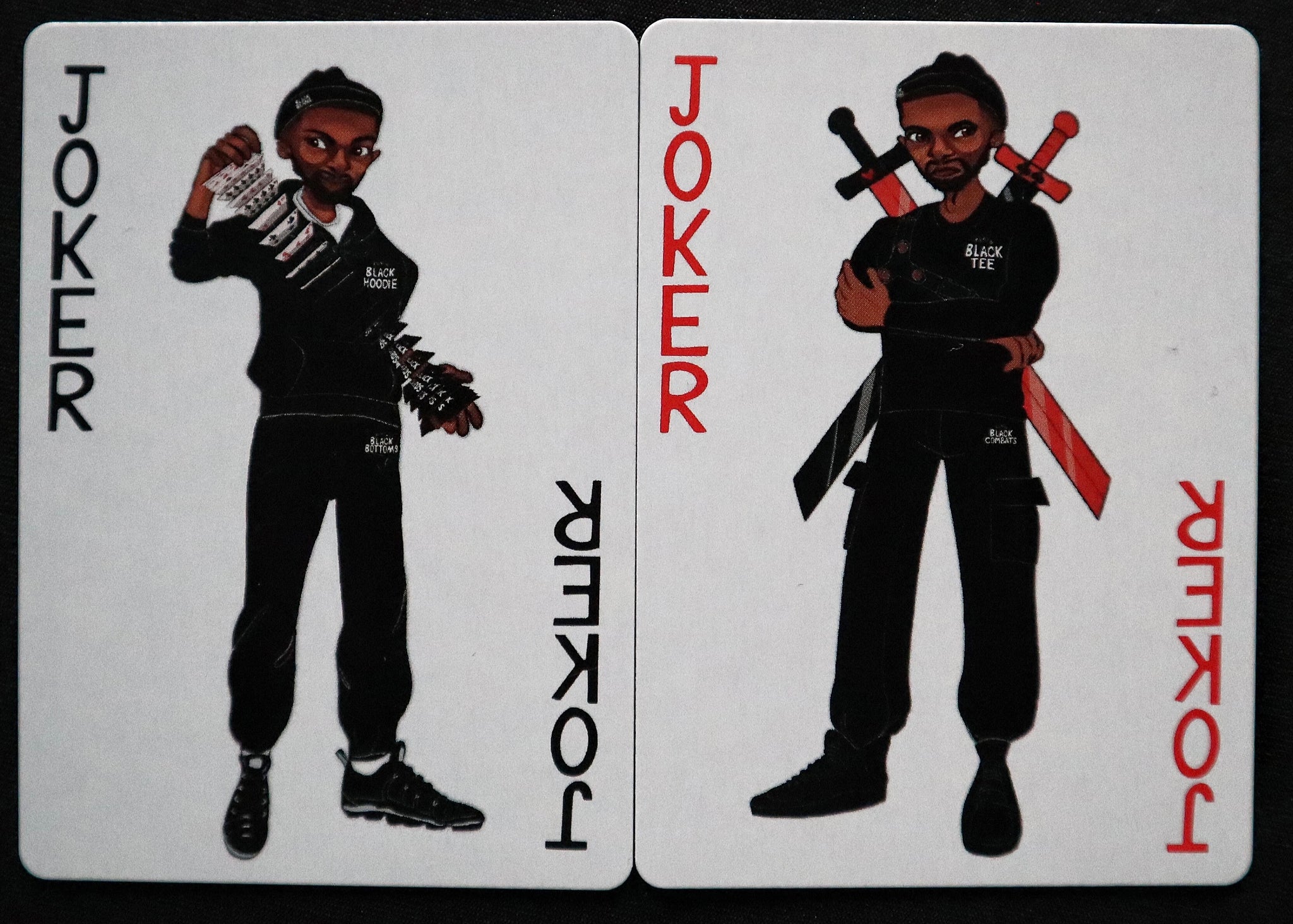 plain decks, plain black cards, black people on playing cards, bespoke playing cards, high quality playing cards, it is what it is, the plain shop, red joker, black joker, jokers